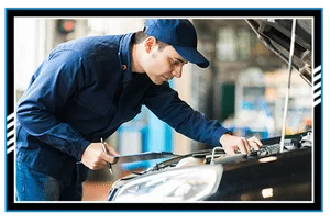 Mechanic at work in his garage