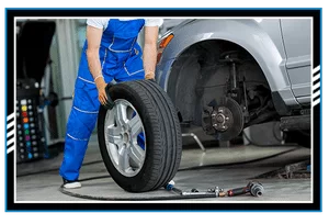 disc brake on car in process of new tire replacement